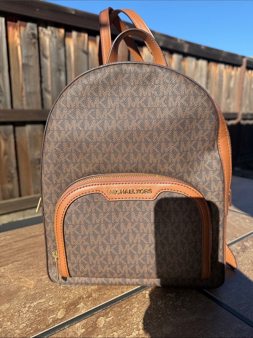 Brand New!! Michael Kors Brown Signature Monogram Backpack with Tan Trim